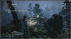 Po przejściu przez most, na którym wrogowie zachodzą Alana z dwóch stron, zbadaj dokładnie krawędzie urwiska przy wejściu na most - Alan Wake: Termosy odc. 3, Okup - lokacje, znajdźki - Alan Wake - poradnik do gry