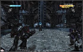 Po znalezieniu się na górze rusz do przodu kolejnym korytarzem [1] - - Część 1 - Ciemny Energon (2) - Opis przejścia - Transformers: Wojna o Cybertron - poradnik do gry