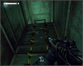 Gdy zginie, schylamy się i wchodzimy do tunelu znajdującego się zaraz na przeciwko drzwi [1] - - Dzielnica Robotnicza (6) | Opis przejścia Singularity - Singularity - poradnik do gry