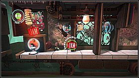 W następnym wagonie trafimy na dżem - za jego pomocą można między innymi zbierać przedmioty (wystarczy rzucić kulą przysmaku w bańkę z nagrodą) - Pociąg-pułapka | Laboratorium Wiktorii | LittleBigPlanet 2 - LittleBigPlanet 2 - poradnik do gry