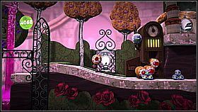 Dalej przesuwamy się po poręczy tak aby ominąć platformy z kolcami - Sprytne ciastka | Laboratorium Wiktorii | LittleBigPlanet 2 - LittleBigPlanet 2 - poradnik do gry