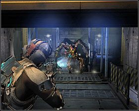 Tu podejdź do większej bramy i doprowadź do jej podniesienia się - Rozdział 11 (4) | Opis przejścia gry Dead Space 2 - Dead Space 2 - poradnik do gry