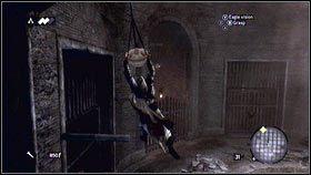 Z niego możesz chwycić się lampy i przeskoczyć na druga stronę krat [1] - Legowiska Romulusa (7) | Zadania poboczne Assassins Creed Brotherhood - Assassins Creed: Brotherhood - poradnik do gry