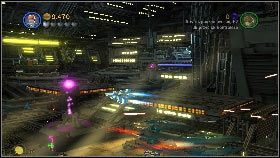 Podejdź do dźwigni z prawej [1] i aktywuj ją, dzięki czemu uruchomisz podajnik torped - Generał Grievous (3) | Tryb fabularny | LEGO Star Wars III The Clone Wars - LEGO Star Wars III: The Clone Wars - poradnik do gry