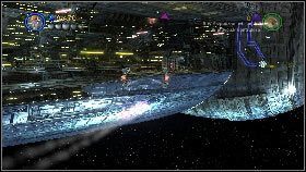 Następnie przymierz we wszystkie fioletowe tarcze znajdujące się wewnątrz wielkiego statku [1] i zacznij je niszczyć - Generał Grievous (3) | Tryb fabularny | LEGO Star Wars III The Clone Wars - LEGO Star Wars III: The Clone Wars - poradnik do gry