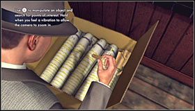 Po tym jak znajdziesz się wewnątrz budki podejdź do lewego kartonowego pudła #1 i wciśnij przycisk A żeby zajrzeć do środka - Case 14 - The Black Caesar (2) | Główne śledztwa w LA Noire - L.A. Noire - poradnik do gry