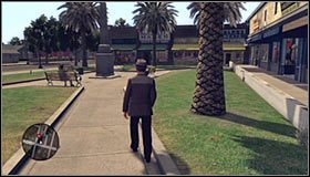 Kontynuuj śledzenie kobiety, tym razem kierując się w prawo #1 i przechodząc przez niewielki plac #2 - Case 15 - The Set Up (2) | Główne śledztwa w LA Noire - L.A. Noire - poradnik do gry