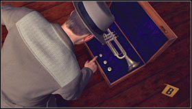 Kontynuuj eksplorację tego pomieszczenia, podchodząc do leżącej na ziemi walizki #1 - Case 16 - Manifest Destiny (1) | Główne śledztwa w LA Noire - L.A. Noire - poradnik do gry