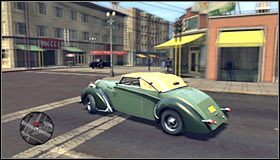 Jedź cały czas prosto, wjeżdżając na niewielką górkę i skręcając w lewo dopiero po dotarciu do jednej z głównych ulic miasta #1 - Paper Sack Holdup | Przestępstwa w LA Noire - L.A. Noire - poradnik do gry