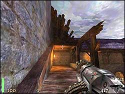 Wracamy na dziedziniec, przez dziurę obok pochylonej belki dostajemy się na dół i rozprawiamy się z przeciwnikami - Mission 7: Part 2 | Solucja Return to Castle Wolfenstein - Return to Castle Wolfenstein - poradnik do gry