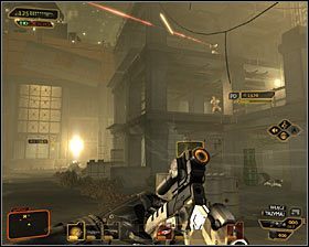 Tuż po zniszczeniu maszyny bojowej pobiegnij na północ (w stronę śmigłowca Malik) i szybko rozpraw się z drugim silnie opancerzonym przeciwnikiem #1 - (1) Wariant pokojowy - Wydostanie się z terenu budowy | Deus Ex Bunt Ludzkości - Deus Ex: Bunt Ludzkości - Directors Cut - poradnik do gry