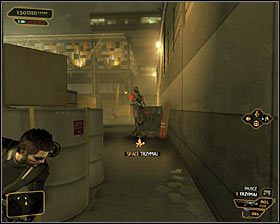 Po znalezieniu się na zewnątrz zwróć uwagę na dwóch tutejszych wartowników - (1) Wariant pokojowy - Dotarcie do głównego placu | Deus Ex Bunt Ludzkości - Deus Ex: Bunt Ludzkości - Directors Cut - poradnik do gry