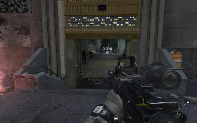 Uporaj się z niedobitkami na placu i wejdź do budynku przez przejście znajdujące się na prawo od placu - I- Black Tuesday | Opis przejścia gry | Call of Duty Modern Warfare 3 - Call of Duty: Modern Warfare 3 - opis przejścia i operacje specjalne - poradnik do gry