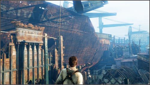 Przechodzimy przez wąski korytarz i otwieramy metalowe drzwi by znaleźć się na zewnątrz na cmentarzysku statków [1] - Rozdział 12- Porwanie (1) | Opis przejścia Uncharted 3 Oszustwo Drakea - Uncharted 3: Oszustwo Drakea - poradnik do gry