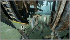 Korzystając z opuszczonego dźwigu wskakujemy na ściankę [1] przed nami i przechodzimy po niej w lewo i w dół by wskoczyć na rurki pod metolowym pomostem [2] - Rozdział 12- Porwanie (2) | Opis przejścia Uncharted 3 Oszustwo Drakea - Uncharted 3: Oszustwo Drakea - poradnik do gry