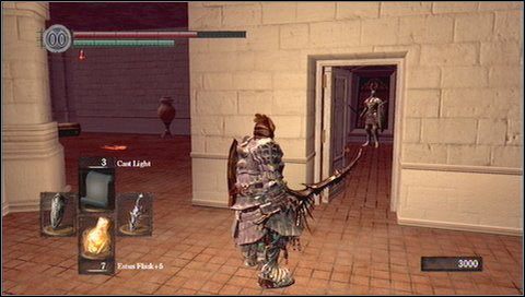 Teraz udajemy się na drugą stronę piętra - przy wyjściu na balkon na końcu korytarza stoi strzelec - Anor Londo (4) | Opis przejścia Dark Souls - Dark Souls - poradnik do gry