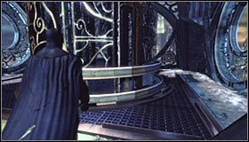 Udaj się prosto i następnie w lewo, docierając do północnej ściany Wieży Cudów - Wedrzyj się na platformę obserwacyjną Wieży, żeby zatrzymać Procedurę 10 | Główny wątek - Batman: Arkham City - poradnik do gry