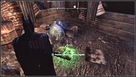 Przeskocz przez płot, przygotuj sobie impuls elektryczny i namierz silnik przemysłowy #1 celem podniesienia tutejszej bramy - Park Row - Trofea Batmana (24-36) | Zagadki w Batman Arkham City - Batman: Arkham City - poradnik do gry