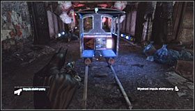 Wyjmij z inwentarza impuls elektryczny i wyceluj w silnik przemysłowy znajdującej się wewnątrz niewielkiej przemysłowy #1 - Dzielnica przemysłowa - Trofea Batmana (01-07) | Zagadki w Batman Arkham City - Batman: Arkham City - poradnik do gry