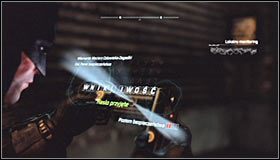 Przeskocz nad niewielkim murkiem i rozejrzyj się w pobliżu miejsca ukrycia trofeum za panelem sterowania #1 - Dzielnica przemysłowa - Trofea Batmana (31-37) | Zagadki w Batman Arkham City - Batman: Arkham City - poradnik do gry