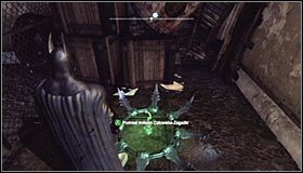 Obróć się w lewo i użyj wybuchowego żelu do zburzenia znajdującej się w tym miejscu ściany #1 - Dzielnica przemysłowa - Trofea Batmana (31-37) | Zagadki w Batman Arkham City - Batman: Arkham City - poradnik do gry