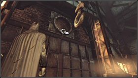 Docelowo musisz rozbujać duży hak na tyle żeby zniszczył duży wentylator na południowej ścianie #1 - Huta - Trofea Batmana (19-24) | Zagadki w Batman Arkham City - Batman: Arkham City - poradnik do gry