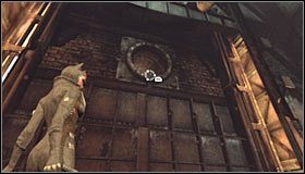 Docelowo musisz rozbujać duży hak na tyle żeby zniszczył duży wentylator na południowej ścianie #1 - Huta - Trofea Kobiety-Kota | Zagadki w Batman Arkham City - Batman: Arkham City - poradnik do gry