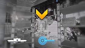 Tuż za barakiem stoją regały, a za jednym z nich znajdziesz plakat propagandowy - Rozdział 12- Downzone | Kampania w Syndicate - Syndicate - singleplayer - poradnik do gry