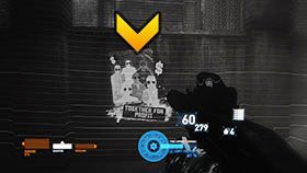 Zanim rzucisz się radośnie do nowej zabawki upuszczonej przez wroga, obejrzyj się za siebie w miejscu w którym zeskoczyłeś do tunelu - wisi tam kolejny plakat propagandowy - Rozdział 14- The Wall | Kampania w Syndicate - Syndicate - singleplayer - poradnik do gry