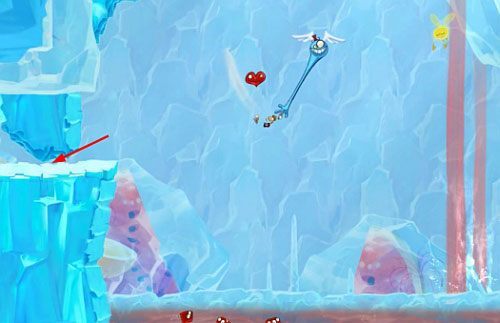 Po przeciwnej stronie znajdziesz drzwi z okiem - Dzwonią dzwonki sań (300 L, 1:50) | Kraina Smakoszy | Rayman Origins - Rayman Origins - poradnik do gry
