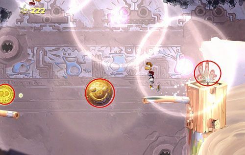Przed drzwiami znajdziesz kolejną roślinkę - Dzikie roje (300 L, 2:10) | Ględzoce Groty | Rayman Origins - Rayman Origins - poradnik do gry
