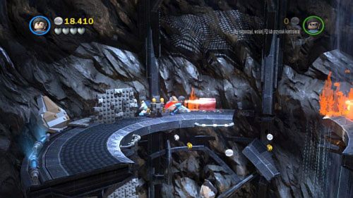 Wejdź na kolejne piętro po ścianie z lewej - Nieproszeni goście | Opis przejścia LEGO Batman 2 DC Super Heroes - LEGO Batman 2: DC Super Heroes - poradnik do gry