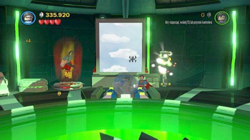 #09 - W pomieszczeniu z dwoma latającymi przeciwnikami podejdź do drzwi z lewej i użyj Jokera na prezencie - Kierunek - Metropolis | Minizestawy LEGO Batman 2 DC Super Heroes - LEGO Batman 2: DC Super Heroes - poradnik do gry