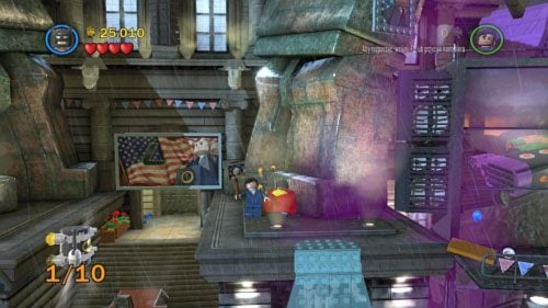 #07 - W pierwszej lokacji po wejściu po zmarzlinie na górę natkniesz się na człowieka z transparentem, a za nim na kamienne głazy - Nowy prezydent | Minizestawy LEGO Batman 2 DC Super Heroes - LEGO Batman 2: DC Super Heroes - poradnik do gry