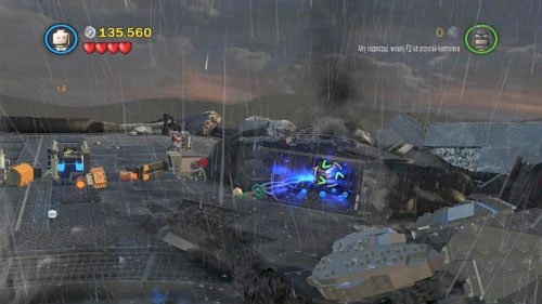#10 - Z prawej strony placu na którym walczysz z robotem jest kontener z czarnymi klockami - Nie wierzę w wieże | Minizestawy LEGO Batman 2 DC Super Heroes - LEGO Batman 2: DC Super Heroes - poradnik do gry
