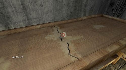 Kiedy staniesz przy stole użyj gałęzi (wooden branch) na wystającej rękojeści (stuck bone hilt) (obrazek) - Zwiedzamy dom | Opis przejścia Anna - Anna - poradnik do gry