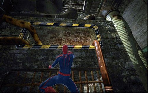 Pobiegnij na sam jego koniec, a następnie przejdź przez dziurę w ścianie - 04 - The Thrill of the Hunt - kanały - Opis przejścia - Niesamowity Spider-Man - poradnik do gry