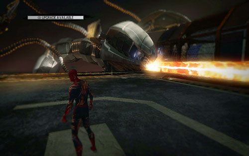Po otrzymaniu pierwszego ciosu, robot zmieni rodzaj swojego ataku - 06 - Smythe Strikes Back - lasery i promienie - Opis przejścia - Niesamowity Spider-Man - poradnik do gry