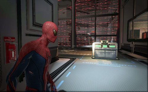 Trzeci umieszczono w pomieszczeniu ze ściana laserów i trzema wieżyczkami - 06 - Smythe Strikes Back - Nagrania, Magazyny, Instrukcje - Znajdźki - Niesamowity Spider-Man - poradnik do gry