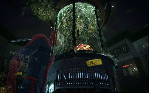 Jest nim dziwna substancja umieszczona za szybą w centrum lokacji - 06 - Smythe Strikes Back - Części technologii, Zdjęcia - Znajdźki - Niesamowity Spider-Man - poradnik do gry