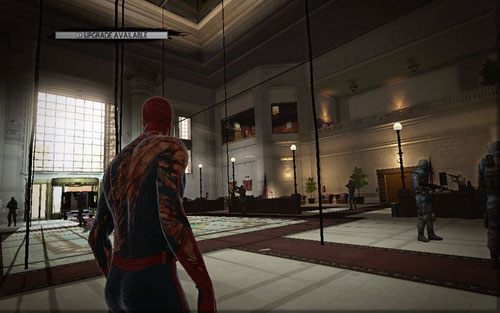 Po wkroczeniu oddziału SWAT ustaw się twarzą do wyjścia, a następnie spójrz w prawo do góry - St. Gabriels Bank - Znajdźki - Niesamowity Spider-Man - poradnik do gry