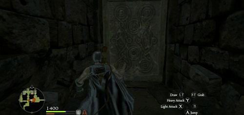 Cofamy się przed most i skręcamy do ciemnego korytarza, na końcu którego są zamknięte drzwi - The Watergods Altar | Akt 2 (ZG) w Dragons Dogma - Dragons Dogma - poradnik do gry