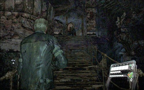 Idąc dalej przed siebie na jednej z linowych kładek spotkasz wielkiego grubasa - 3 - Wnętrze ziemi | Kampania Leona | Solucja Resident Evil 6 - Resident Evil 6 - poradnik do gry