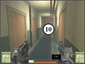 Zabij ostatniego strażnika w korytarzu (11) i odnajdź wyjście prowadzące na pokład, gdzie jest dużo kontenerów - Seaward | Soldier of Fortune 2 Double Helix - Soldier of Fortune 2: Double Helix - poradnik do gry