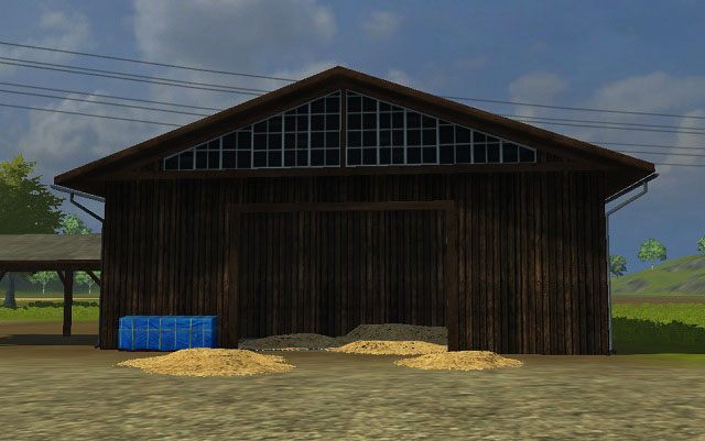 Skup siana i trawy. Wystarczy umieścić w nim przyczepę i rozładować ją, a otrzymamy pieniądze. - Lokacje i budynki | Podstawy Farming Simulator 2013 - Farming Simulator 2013 - poradnik do gry
