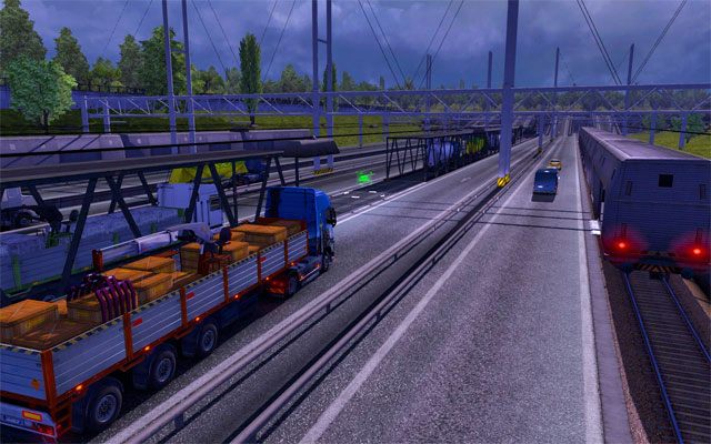 Zjedź na dół i na jednym z wagonów stań swoim ciągnikiem na zielonej ikonce (zatwierdź wybór domyślnie [Enterem]) - ETS2: Porty i eurotunel - Euro Truck Simulator 2 - poradnik do gry