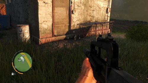 Posążek odnajdziesz z lewej strony budynku, przy klatce pokazanej na obrazku - Wyspa południowa (południowy zachód) | Przedmioty kultu (ukryte przedmioty) - Far Cry 3 - poradnik do gry