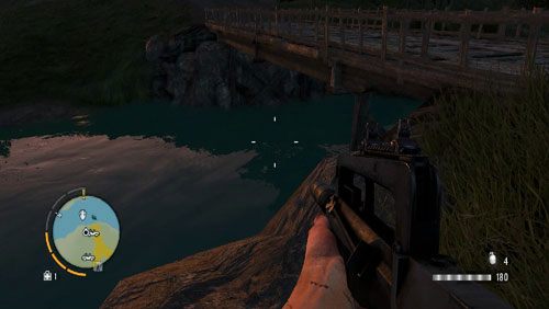 Zanurkuj z lewej strony mostu pokazanego na obrazku, by na dnie odnaleźć przedmiot - Wyspa południowa (południowy zachód) | Przedmioty kultu (ukryte przedmioty) - Far Cry 3 - poradnik do gry