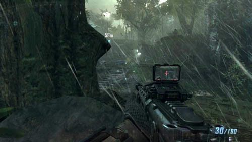 Obróć się o 180 stopni, a zauważysz dwa rosnące blisko siebie drzewa, obok których przechodziłeś - 02 - Celerium | Misje - Opis przejścia | Call of Duty Black Ops II - Call of Duty: Black Ops II - poradnik do gry