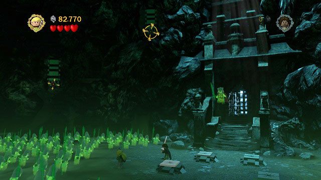 Podczas walki z Królem Umarłych wystarczy zestrzelić trzy tarcze znajdujące się na arenie - Ścieżki umarłych | Znajdźki | LEGO The Lord of the Rings - LEGO The Lord of the Rings: Władca Pierścieni - poradnik do gry